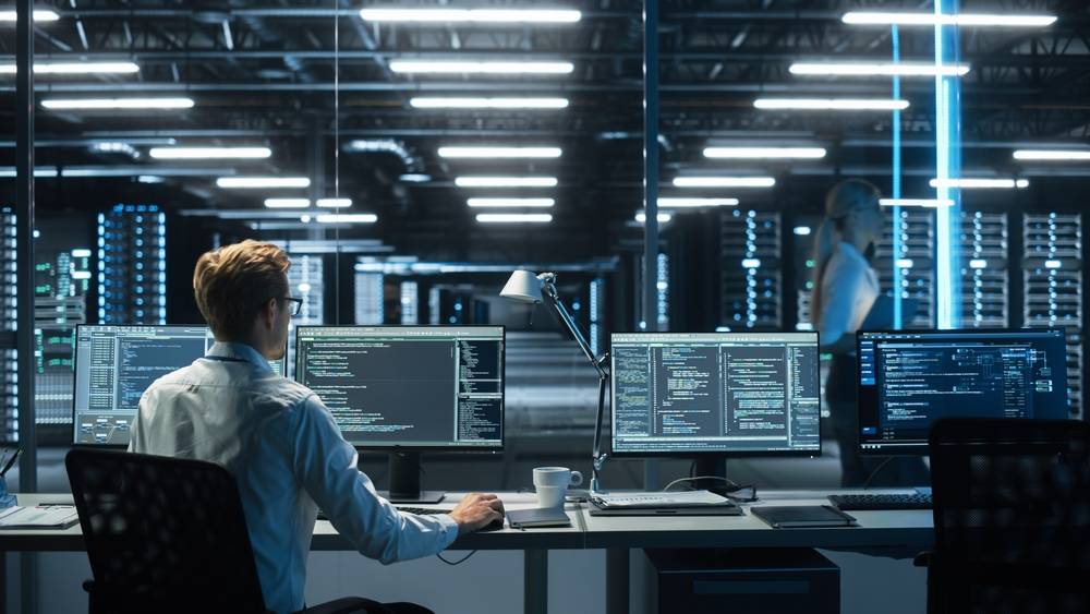 Man Plans and Carries Out Work to Expand the Network Structure of the Enterprise at His Office